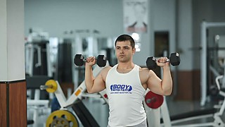 Standing Alternating Dumbbell Press