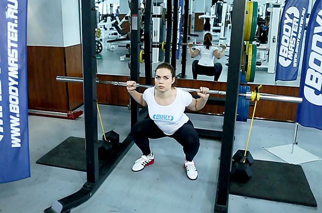 Photo of Squat with Bands exercise