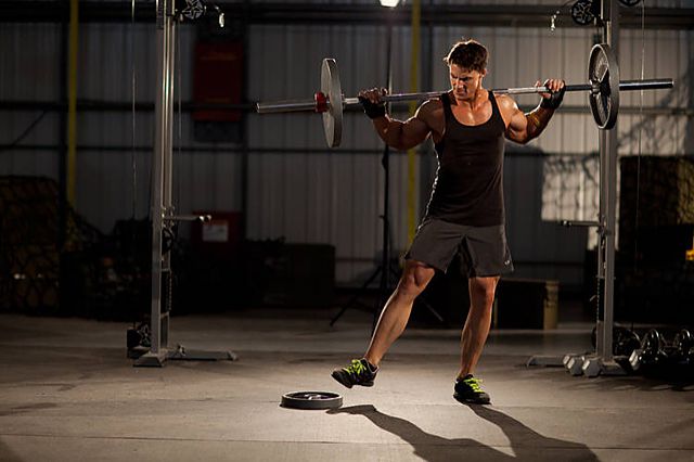 Photo of Squat with Plate Movers exercise