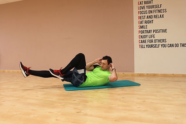 Photo of Elbow to Knee exercise