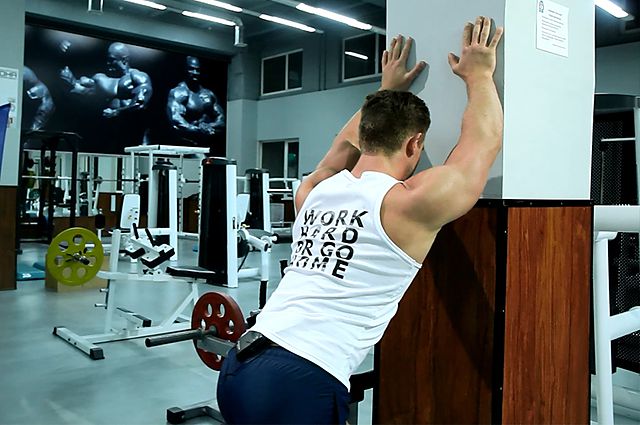 Photo of Calf Stretch Hands Against Wall exercise