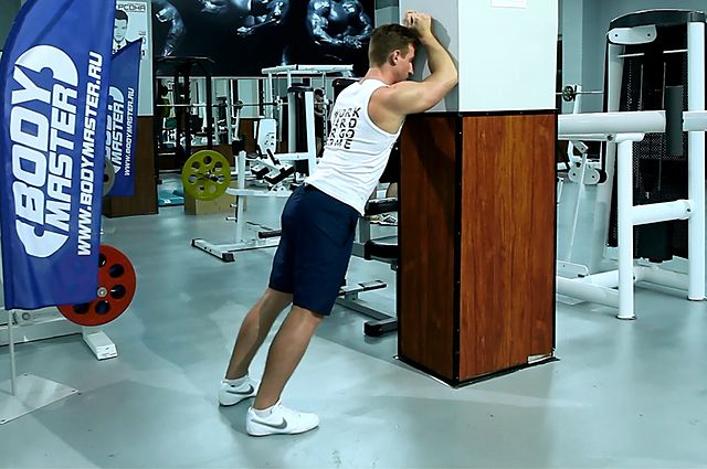 Photo of Calf Stretch Elbows Against Wall exercise