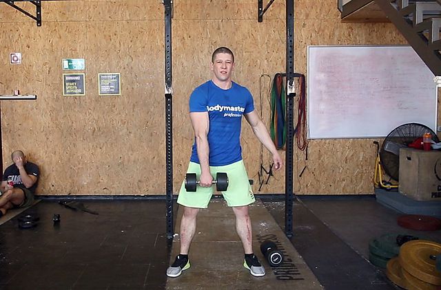 Photo of The Dumbbell Hang Snatch exercise