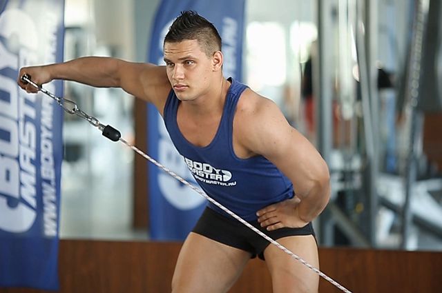 Photo of Bent Over Low-Pulley Side Lateral exercise