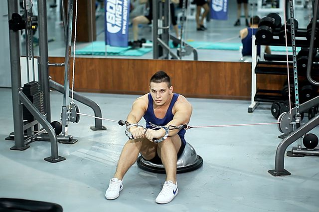 Photo of Bosu Ball Cable Crunch With Side Bends exercise