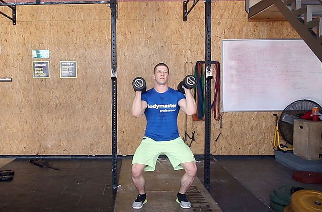 Photo of The Dumbbell Push Jerk exercise