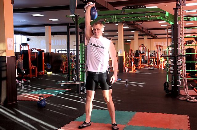 Photo of Kettlebell Turkish Get-Up (Squat style) exercise