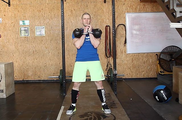Photo of Two-Arm Kettlebell Clean exercise