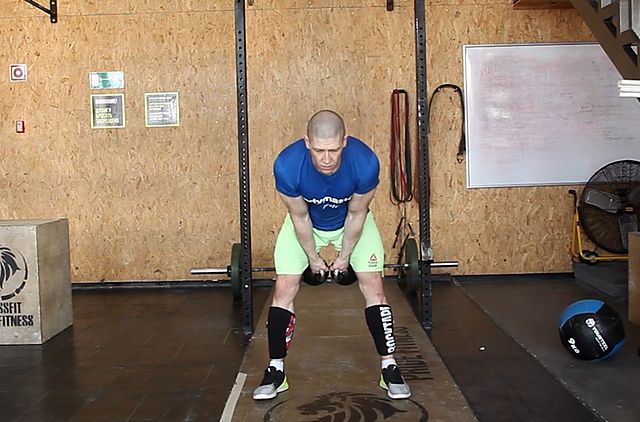Photo of Two-Arm Kettlebell Clean exercise