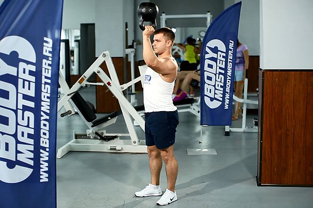 Photo of Bottoms-Up Clean From The Hang Position exercise