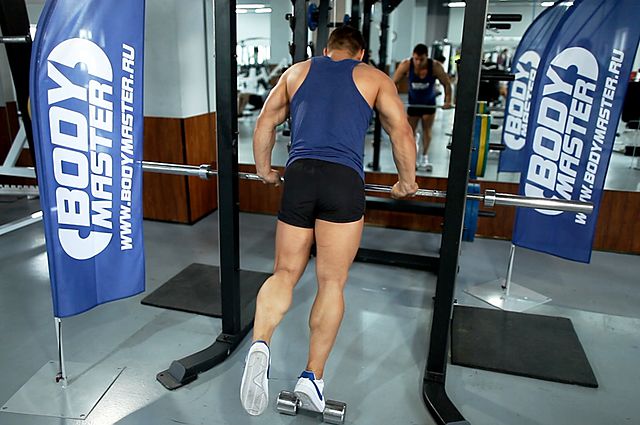 Photo of Calf Raise On A Dumbbell exercise