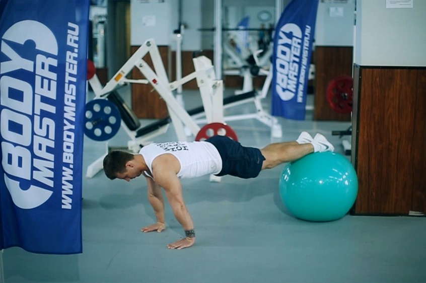 Exercise Push-Ups With Feet On An Exercise Ball