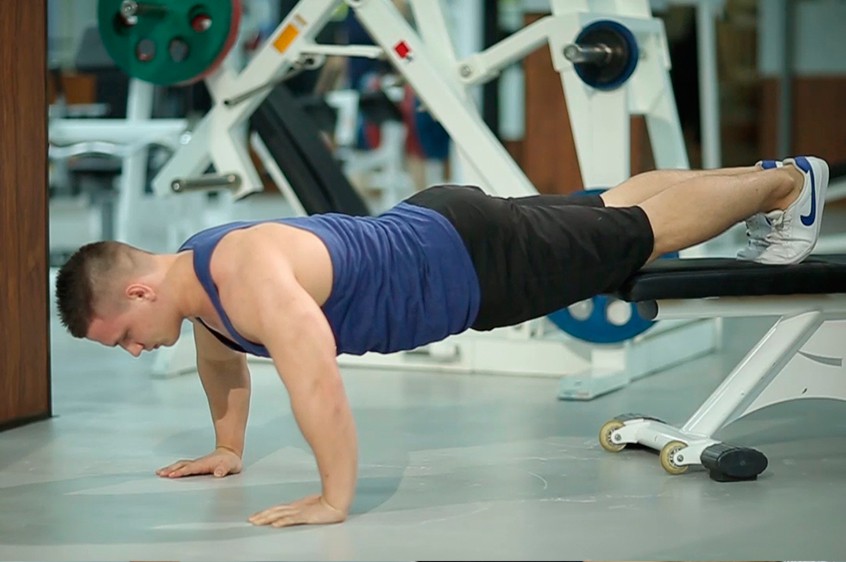 Exercise Push-Ups With Feet Elevated