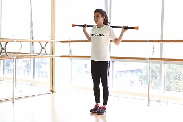 Photo of Side lunges with bodybar exercise