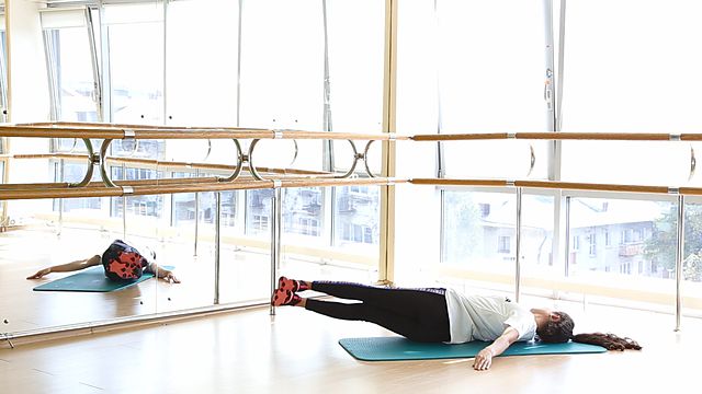 Photo of Circular leg lifts in the lying position exercise