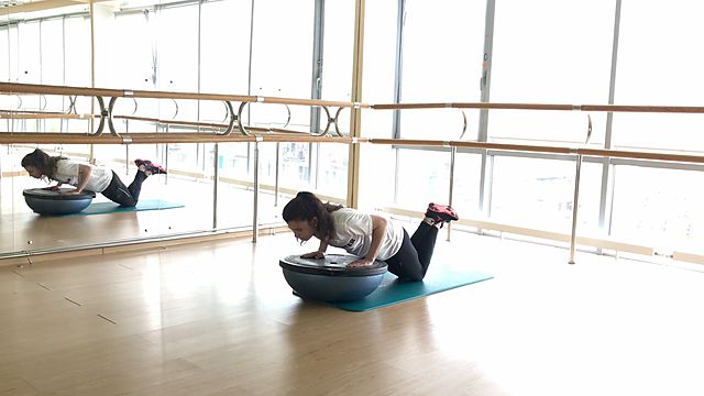 Photo of BOSU Down Push Up exercise