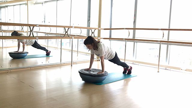 Photo of BOSU Down Push Up exercise