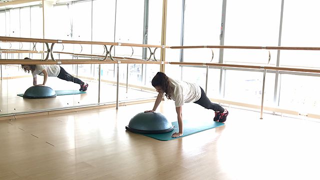 Photo of BOSU Up Single Arm Push Up exercise