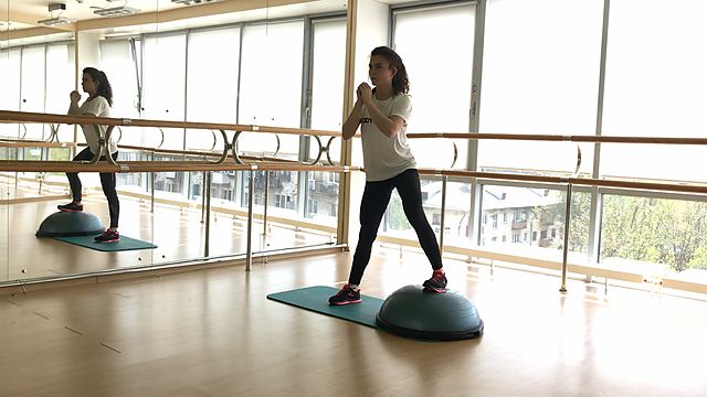 Photo of BOSU one leg squat exercise