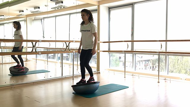 Photo of Rocking standing on BOSU + in squat exercise