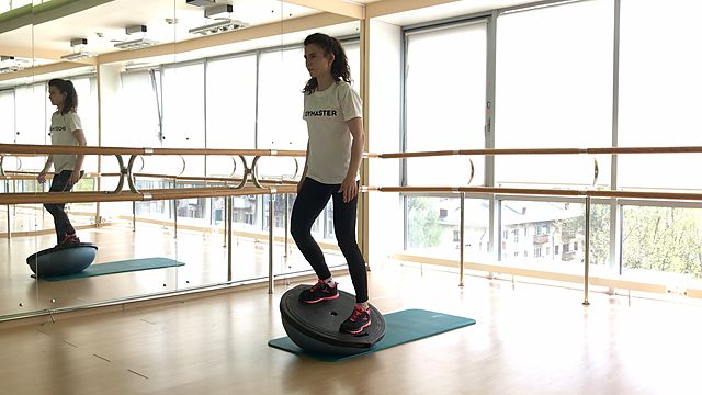 Photo of Rocking standing on BOSU + in squat exercise