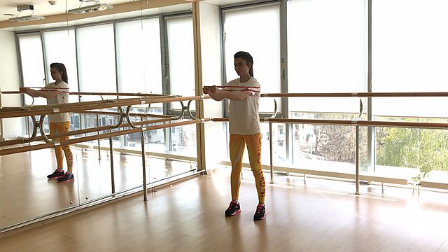 Photo of Hands adduction with rubber band exercise