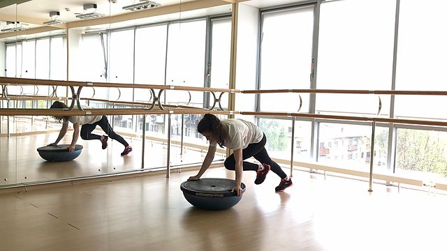 Photo of Rock Climber on BOSU down exercise