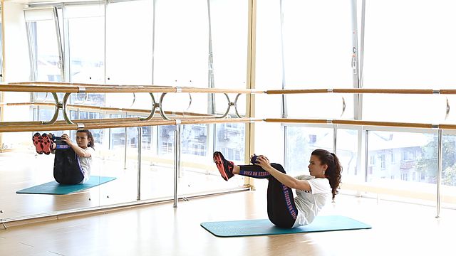 Photo of Dumbbell crunches exercise
