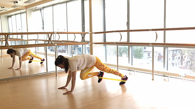 Photo of Slow climber with a mini band exercise