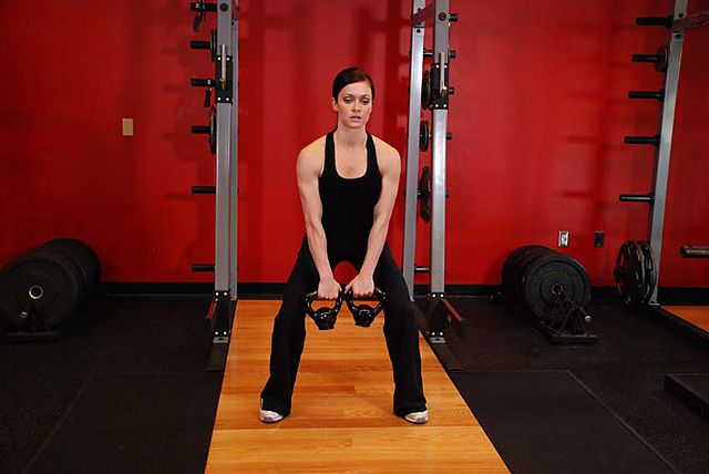 Photo of Double Kettlebell Alternating Hang Clean exercise