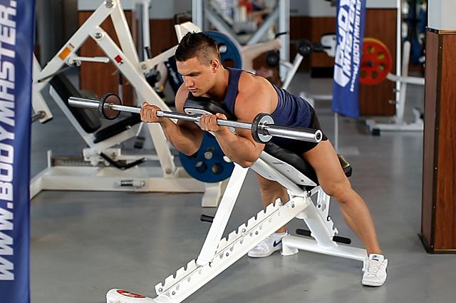 Photo of Barbell Curls Lying Against An Incline exercise
