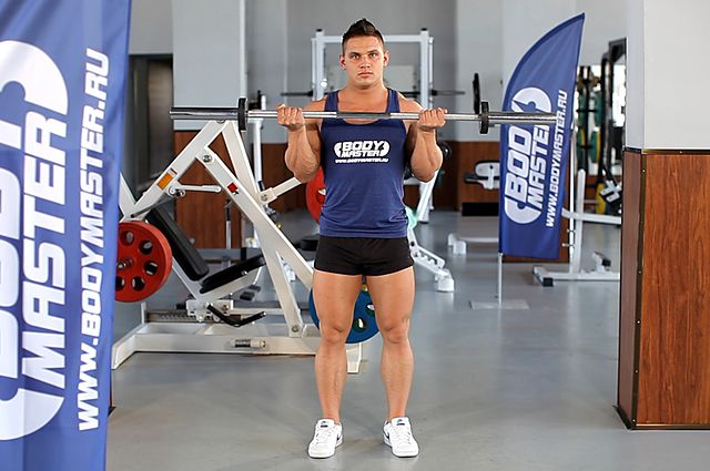Photo of Wide-Grip Standing Barbell Curl exercise