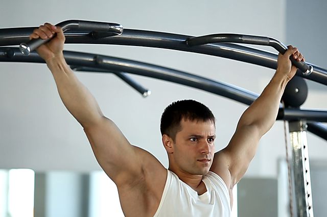Photo of Wide-Grip Rear Pull-Up  exercise