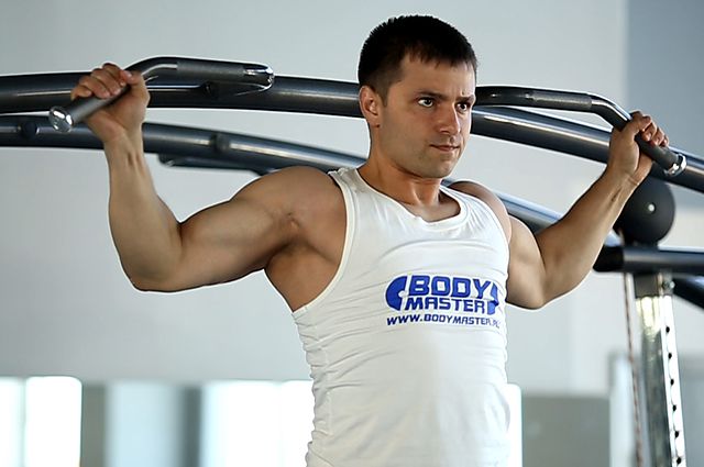 Photo of Wide-Grip Rear Pull-Up  exercise