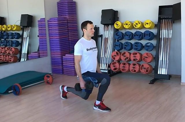 Photo of Dumbbell Rear Lunge exercise