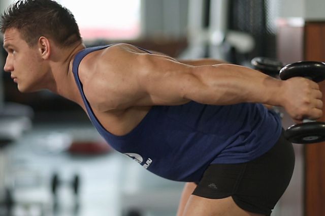Photo of Standing Bent-Over Two-Arm Dumbbell Triceps Extension exercise