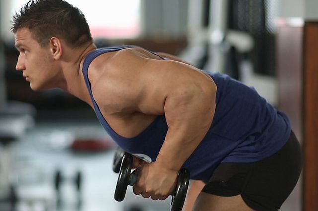 Photo of Standing Bent-Over Two-Arm Dumbbell Triceps Extension exercise