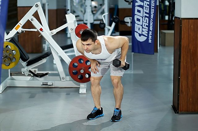 Photo of Standing Bent-Over One-Arm Dumbbell Triceps Extension  exercise