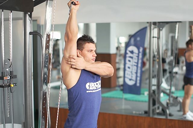 Photo of Standing Low-Pulley One-Arm Triceps Extension exercise