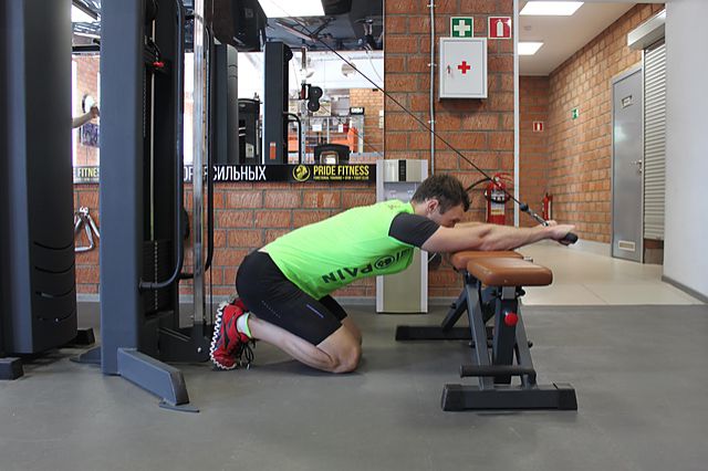 Photo of Kneeling Cable Triceps Extension exercise