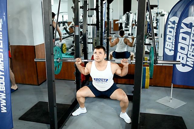 Photo of Reverse Band Power Squat exercise