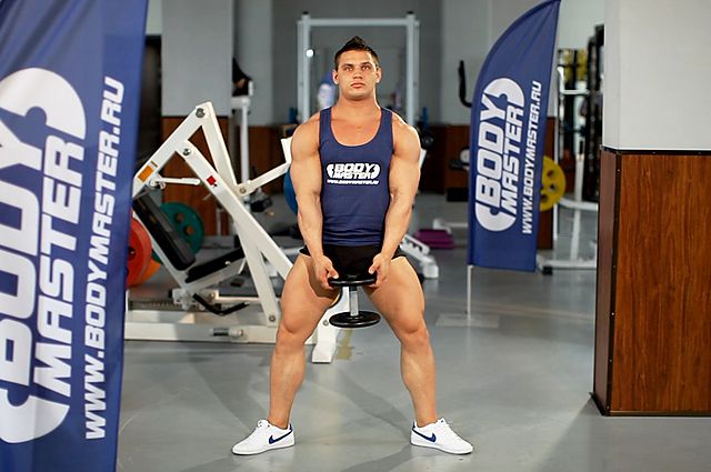 Photo of Plie Dumbbell Squat  exercise