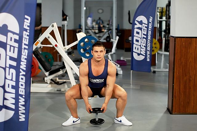 Photo of Plie Dumbbell Squat  exercise