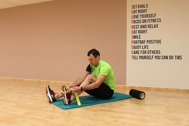 Photo of Seated Hamstring and Calf Stretch exercise