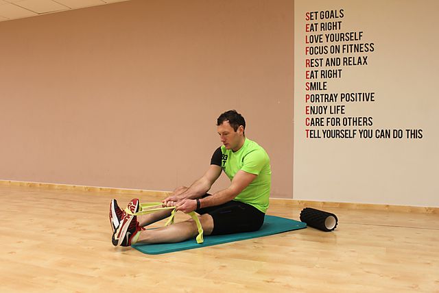 Photo of Seated Hamstring and Calf Stretch exercise