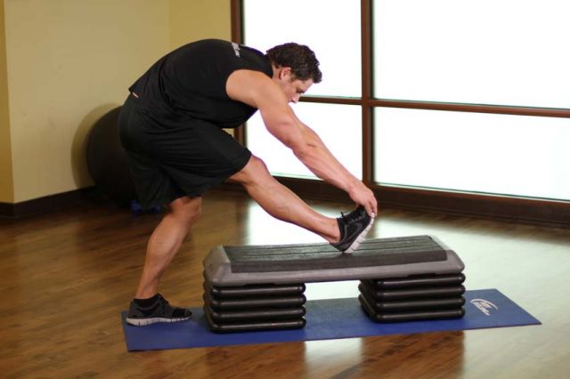 Photo of  Standing Gastrocnemius Calf Stretch  exercise