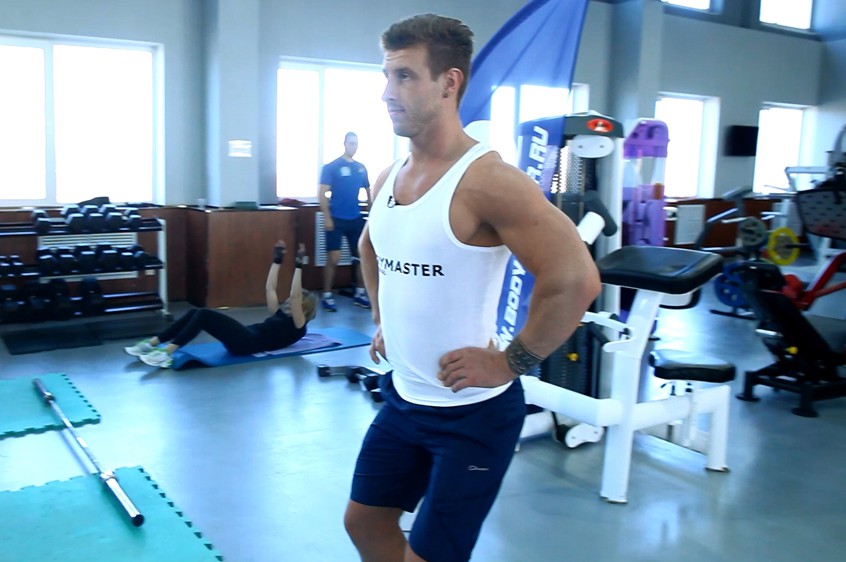 Exercise Standing Pelvic Tilt