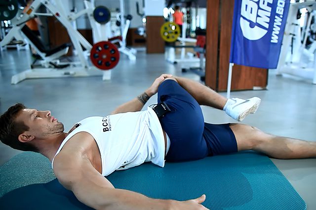 Photo of Knee Across The Body  exercise