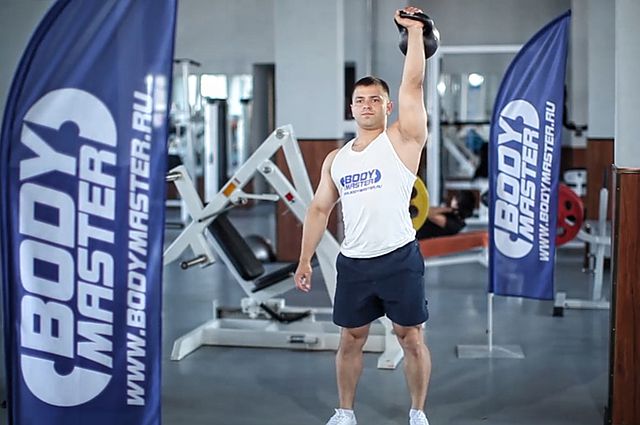 Photo of One-Arm Kettlebell Push Press exercise
