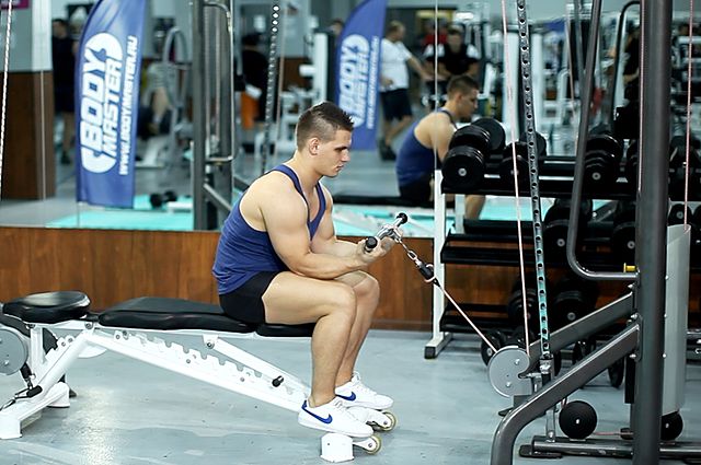 Photo of Seated Two-Arm Palms-Up Low-Pulley Wrist Curl exercise